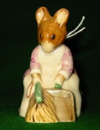 A Beatrix Potter figure "Hunca Munca Sweeping"