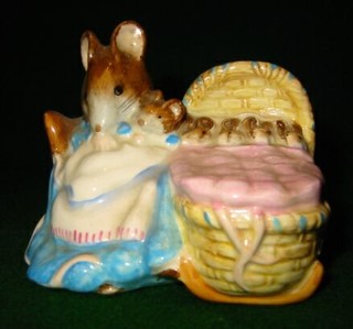 A Beatrix Potter figure "Hunca Munca"