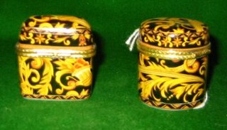 A pair of modern porcelain trinket boxes with hinged lids