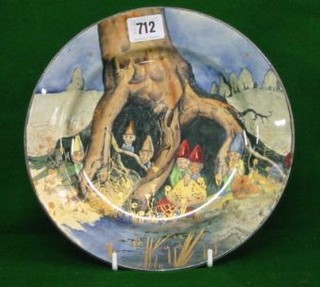 A Royal Doulton seriesware plate decorated elves by a tree stump impressed 10.27 10"