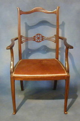 A 19th Century mahogany carver chair with pierced mid rail and upholstered seat on club supports