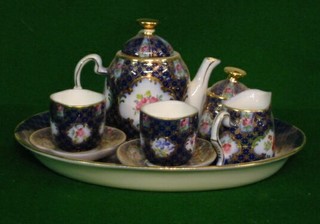 A childs reproduction porcelain tea service