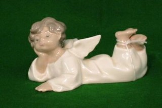 A Lladro figure of an angel, impressed C59, 6" and a ditto seated angel, 4"