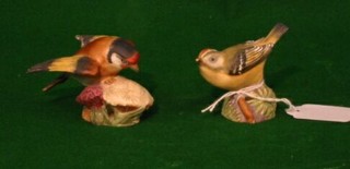 A Royal Worcester porcelain figure of a Goldcrest 3" (beak f) and another Goldfinch 2"