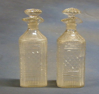 A pair Georgian cut glass spouted decanters and stoppers 8"