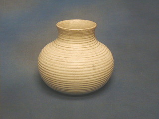 An  oatmeal Art Pottery vase, base marked KP 8"