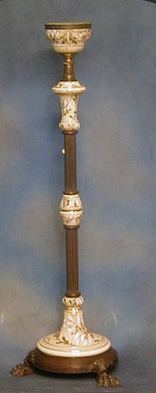 A "Doulton" adjustable standard oil lamp with gilt bronze mounts