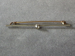 A white metal bar brooch set a white stone