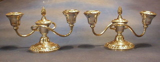 A pair of silver plated 3 light candelabrum