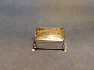 An Edwardian silver trinket box with hinged lid 1910, raised on hoof supports 4" (marks rubbed)