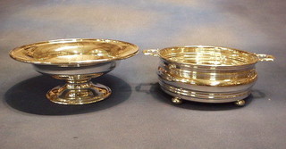 A circular pedestal silver plated bowl and a silver plated twin handled dish frame