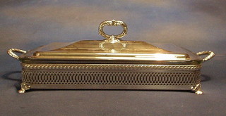 A  rectangular pierced twin handled silver plated entree dish and cover with Pyrex glass liner