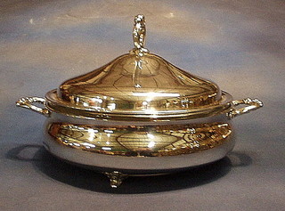 An American "silver" twin handled tureen and cover with Pyrex glass liner, the base marked Made in USA MRRS, 42 ozs