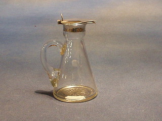 A silver and cut glass whiskey tot with plain silver lid, Birmingham 1915