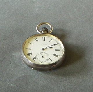 A Victorian open faced pocket watch with enamelled dial and Roman Numerals by Longines contained in a silver case London 1884