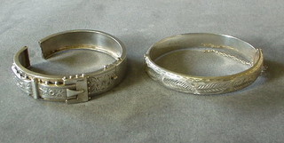 2 silver bracelets (1f)