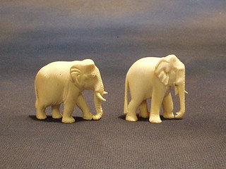 2 carved ivory figures of elephants 2"