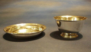 A circular Sterling silver bowl by Tiffany and a circular Sterling coaster by Tiffany