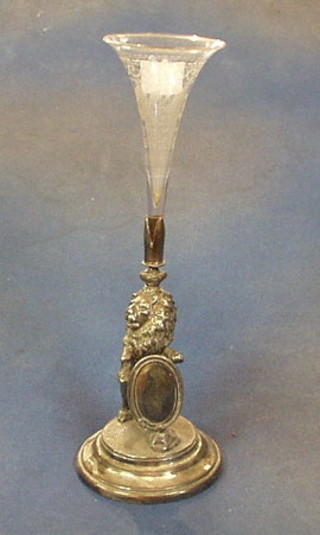 An Edwardian Britannia metal epergne stand complete with  cut glass trumpet shaped vase