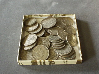 A collection of various silver coins