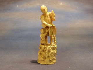 A carved ivory figure 7"