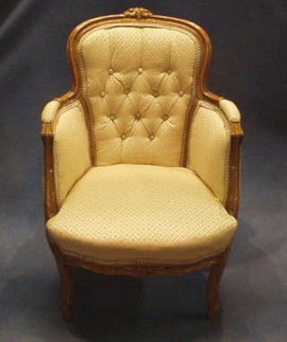 A  French walnutwood showframe 3 piece suite comprising 2 seat settee and 2 matching arm chairs, on French cabriole supports