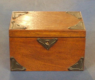 An oak Art Nouveau stationery box with hinged lid and embossed metal mounts 9"