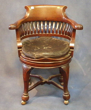 A Victorian mahogany stick and bar back revolving office chair