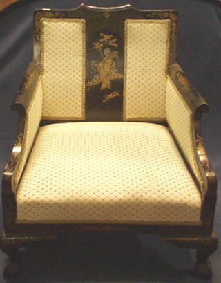 A 19th Century lacquered chinoiserie style armchair upholstered, and on cabriole supports