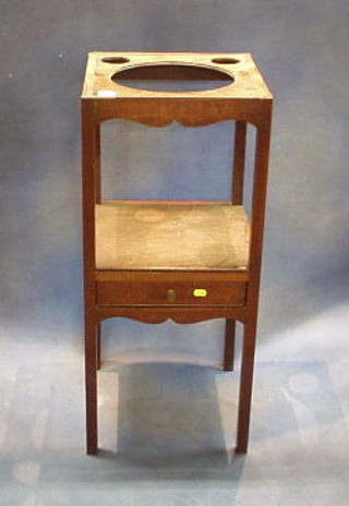 A square Georgian mahogany 2 tier wash stand raised on square supports 14"