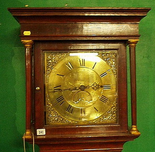 An 18th Century 30  hour longcase clock, the 12" square brass dial with gilt metal spandrels and minute indicator by J Noon of Ashby, contained in an oak case 75"