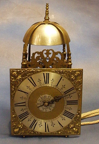 A Victorian 17th Century style, hanging striking 30 hour lantern clock, the 8" square dial with gilt metal spandrels and silvered chapter ring, striking on a bell