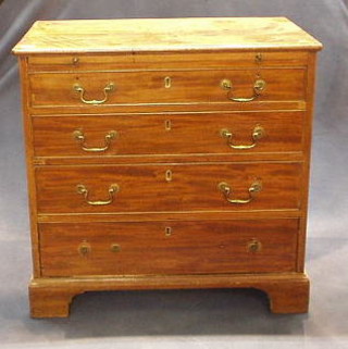 A Georgian mahogany chest of 4 long graduated drawers with swan neck handles and brushing slide, 31"