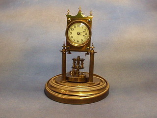 A 400 day clock with enamelled dial and Arabic numerals contained in a gilt metal case complete with dome (case f)