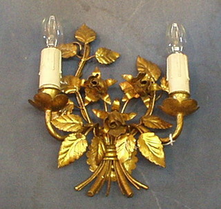 A pair of fine quality gilt metal twin light wall brackets