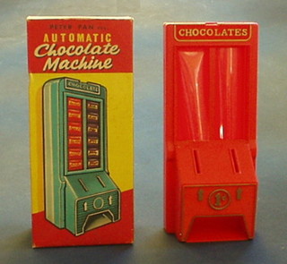 A pre-decimal childs automatic chocolate vending machine