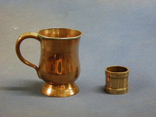 A Victorian 1 1/4 gill brass measure marked W & T Avery Ltd Birmingham and a copper half pint tankard