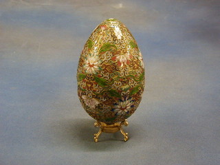 A champleve enamel ornament in the form of a egg 7" (some dents)