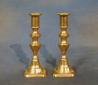 A pair of 19th Century brass candlesticks 7"
