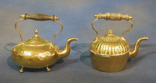2 circular brass kettles