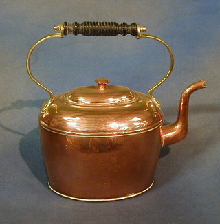 A copper kettle with ebonised handle 10"