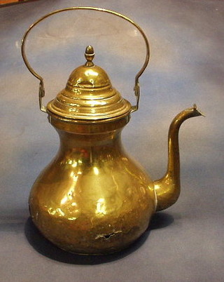 A large Continental brass kettle (slight hole)