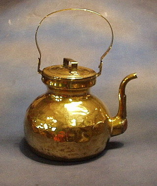 A Continental brass kettle