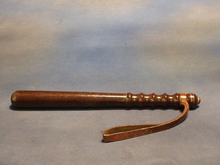 A turned wooden Police truncheon