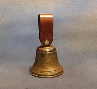 A leather hand bell