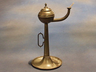 An Art Nouveau pewter oil lamp/table lighter, the base marked 90% JW Zin 11"