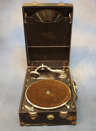 A Mayfair Deluxe model portable manual gramophone contained in a fibre case