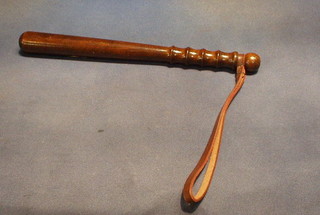 A turned wooden Police truncheon