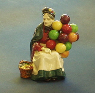 A Royal Doulton figure "The Old Balloon Seller" HN1315, incised 1536 (f and r)