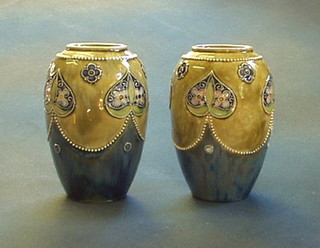 A pair of Royal Doulton blue and green glazed stoneware vases, the bases impressed Royal Doulton 8218 8"